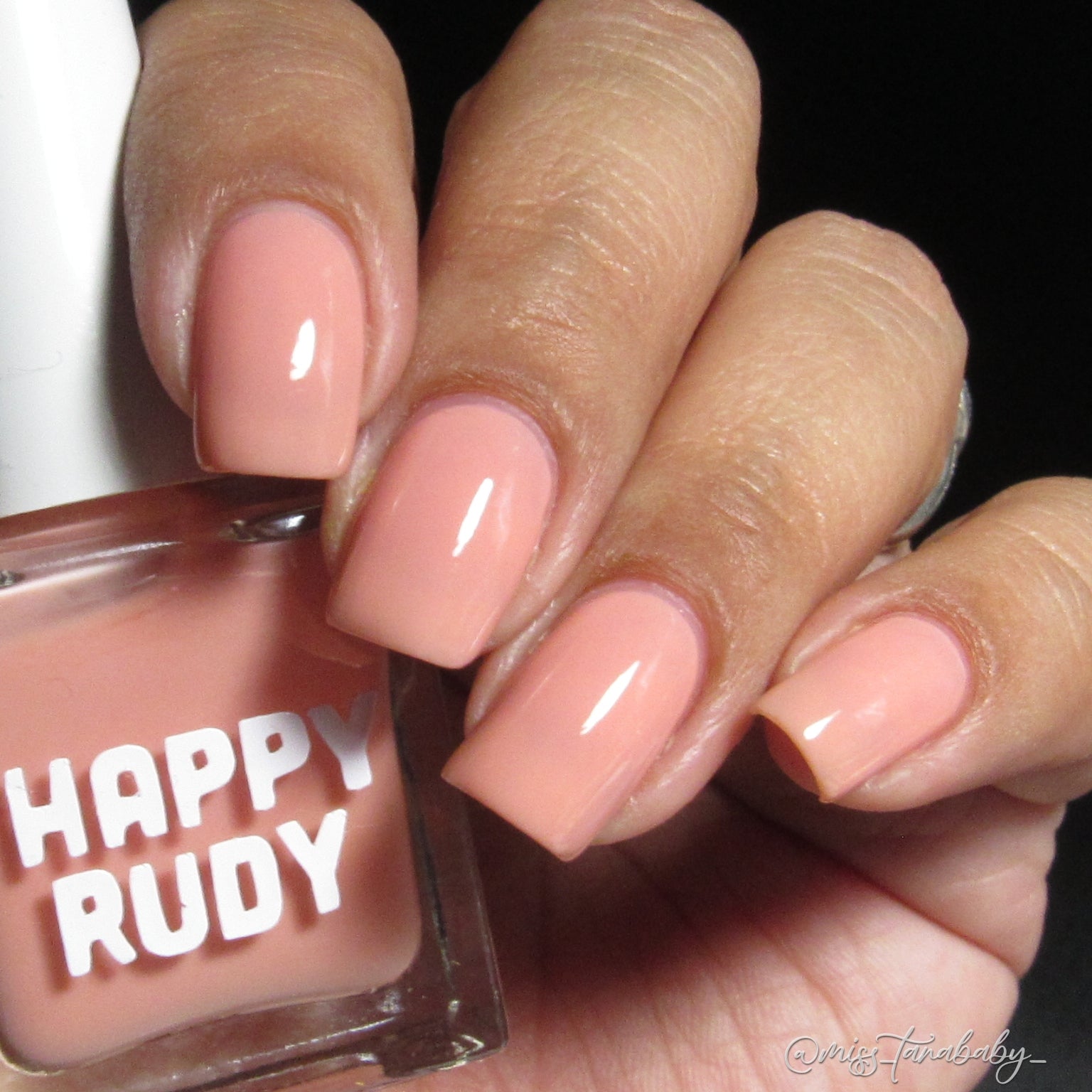 Pink coral crème nail polish inspired by the vibrant spirit of Caribbean Carnival, from the Masquerade Collection.