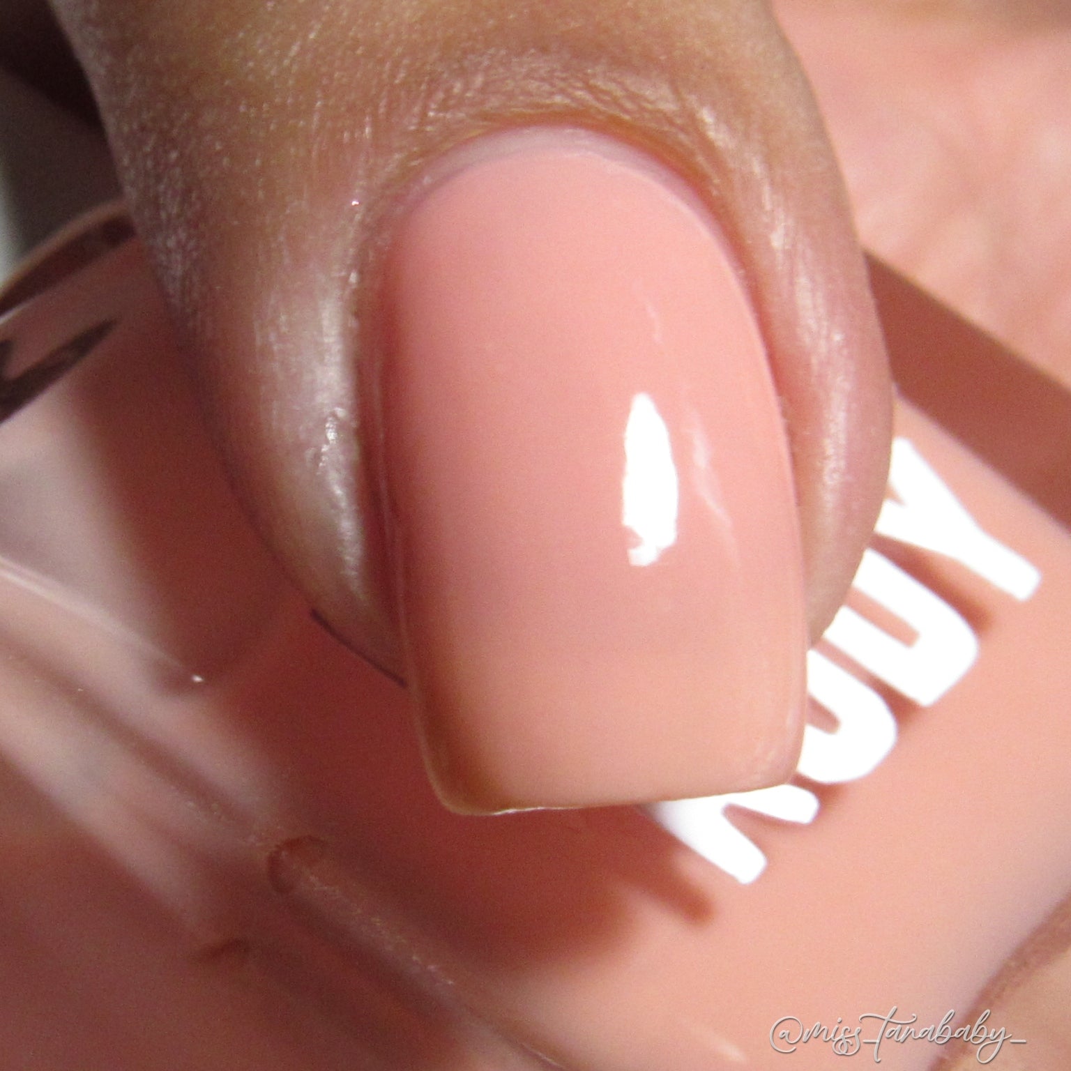 Pink coral crème nail polish inspired by the vibrant spirit of Caribbean Carnival, from the Masquerade Collection.