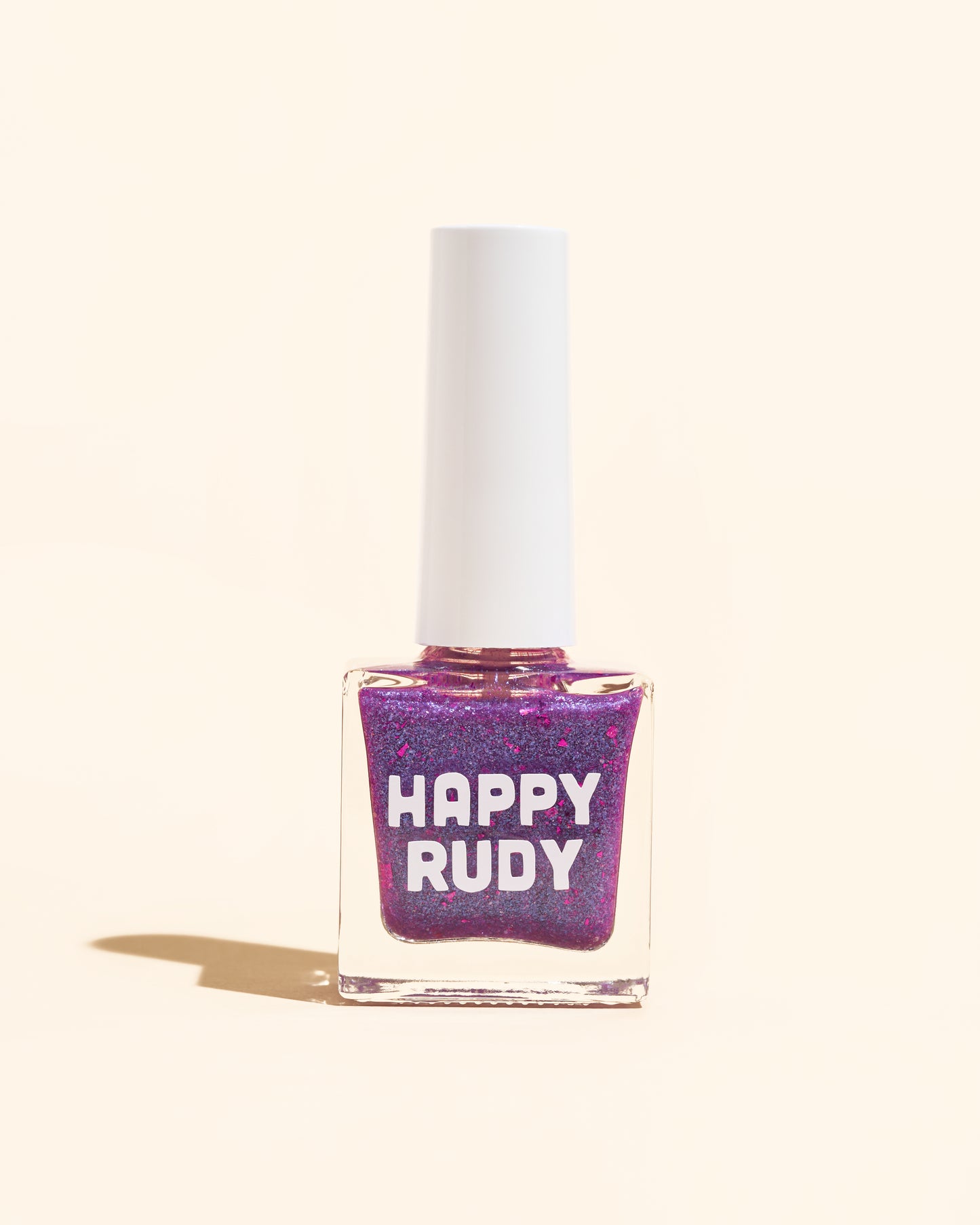 Purple nail polish with magenta flakies inspired by disco glam, from the Studio 54 Collection.