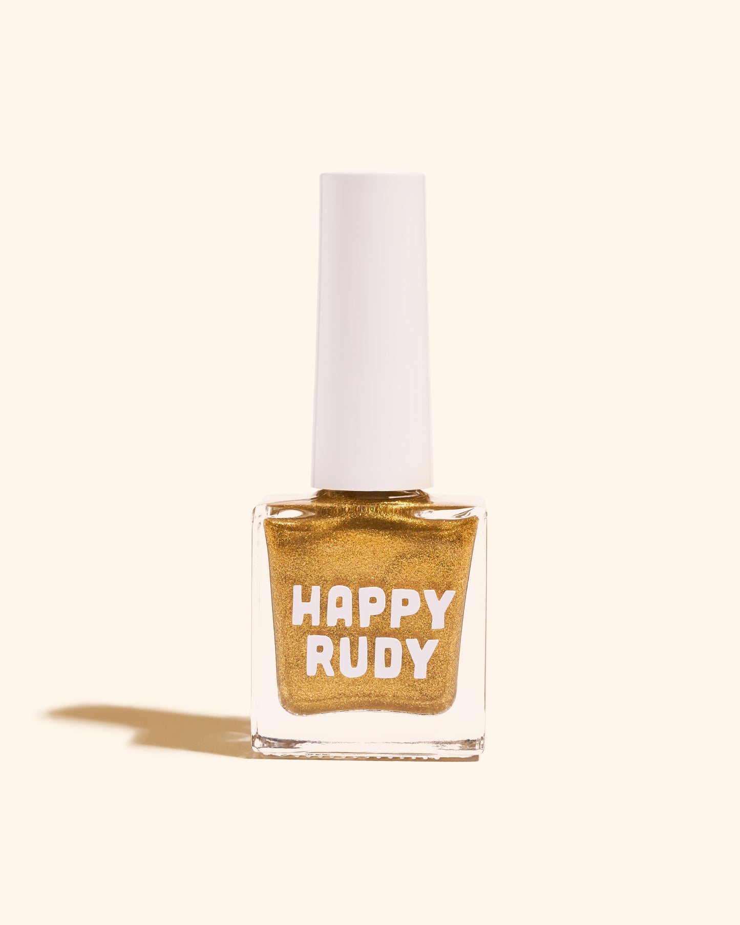 Radiant gold glitter nail polish with eco-friendly sparkle, inspired by Caribbean celebration, from the Masquerade Collection.