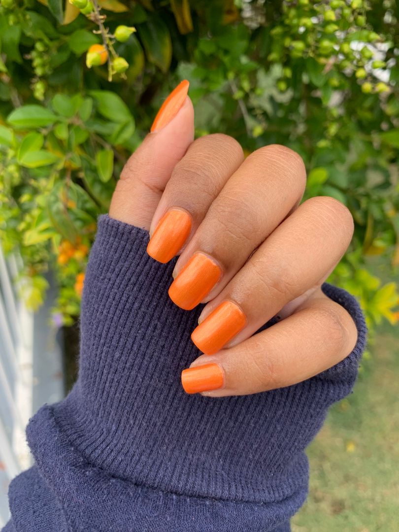 Orange copper shimmer nail polish with bold retro energy, from the Studio 54 Collection.