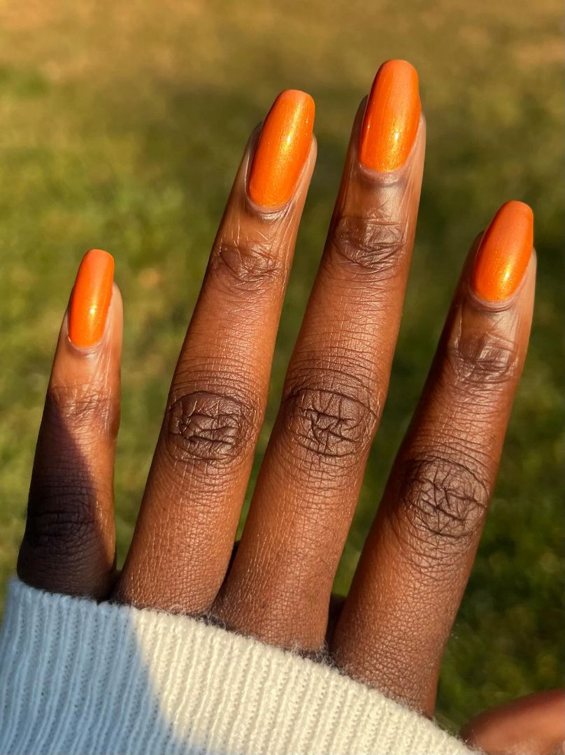 Orange copper shimmer nail polish with bold retro energy, from the Studio 54 Collection.