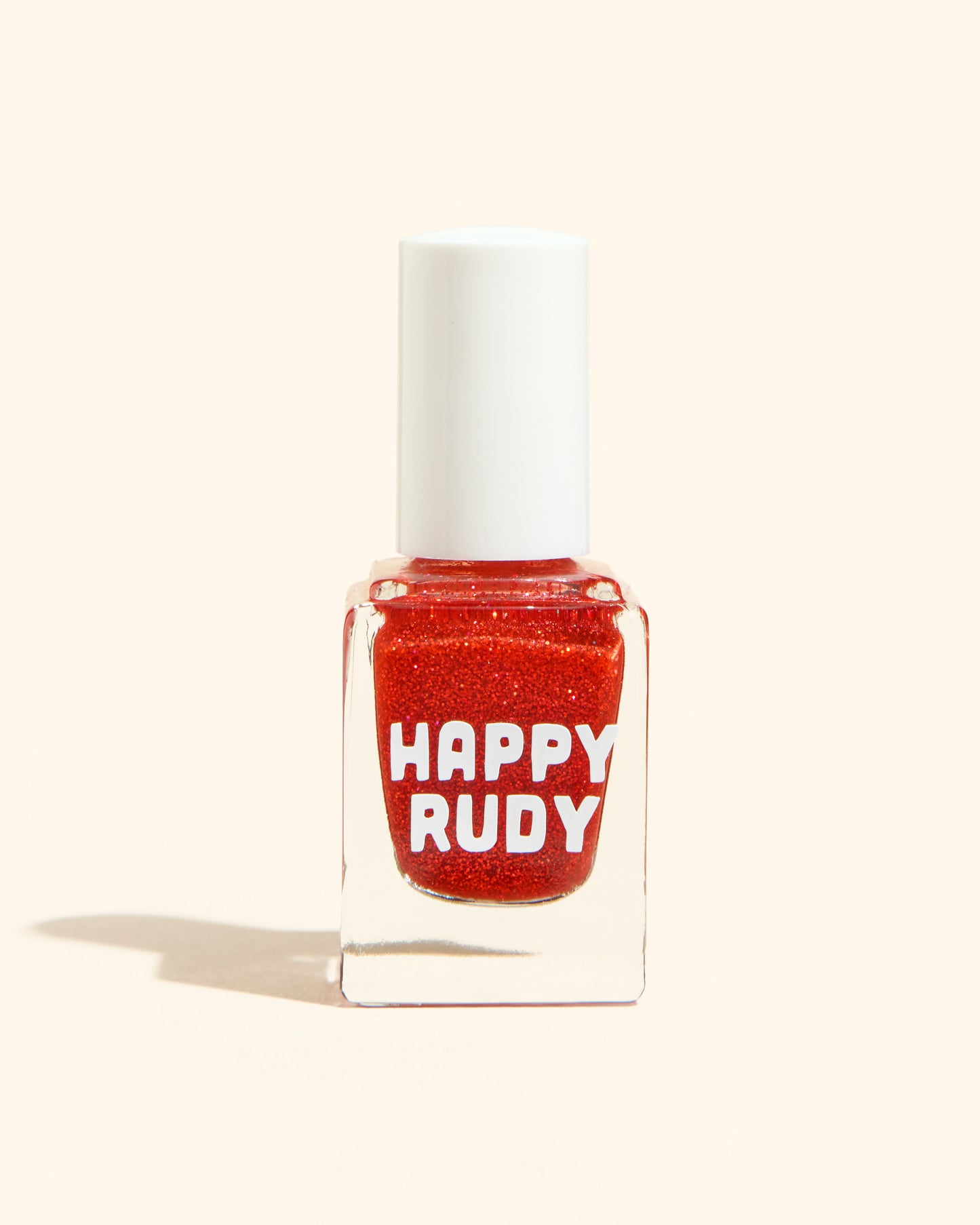 Bold ruby red glitter nail polish perfect for festive looks, part of the Screen and Sparkles collection.