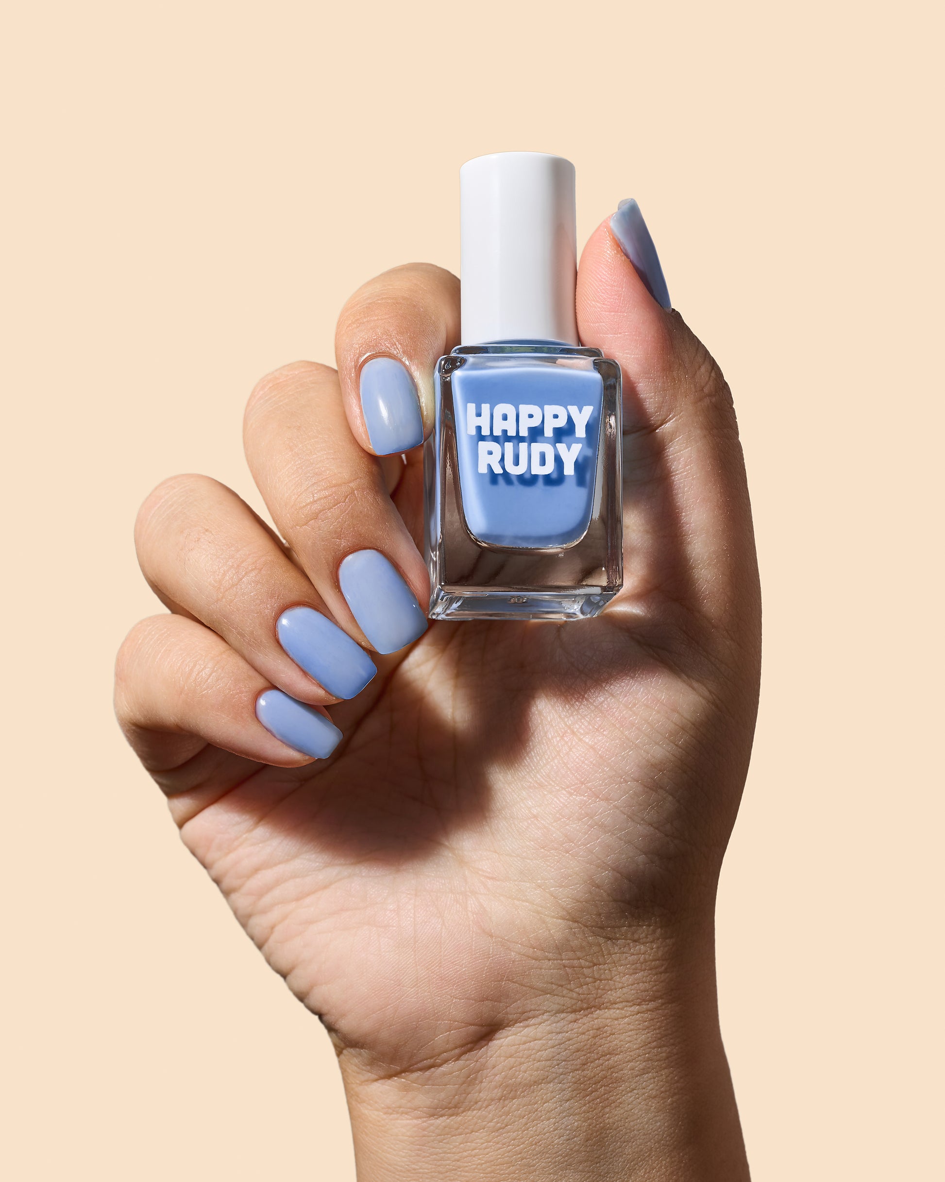 Cornflower blue jelly nail polish with a sheer, shiny finish