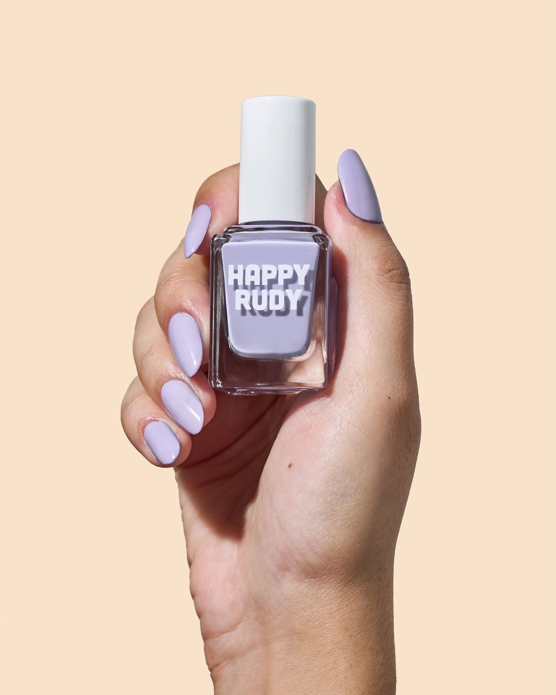 Lavender crème nail polish designed for calm, polished looks.