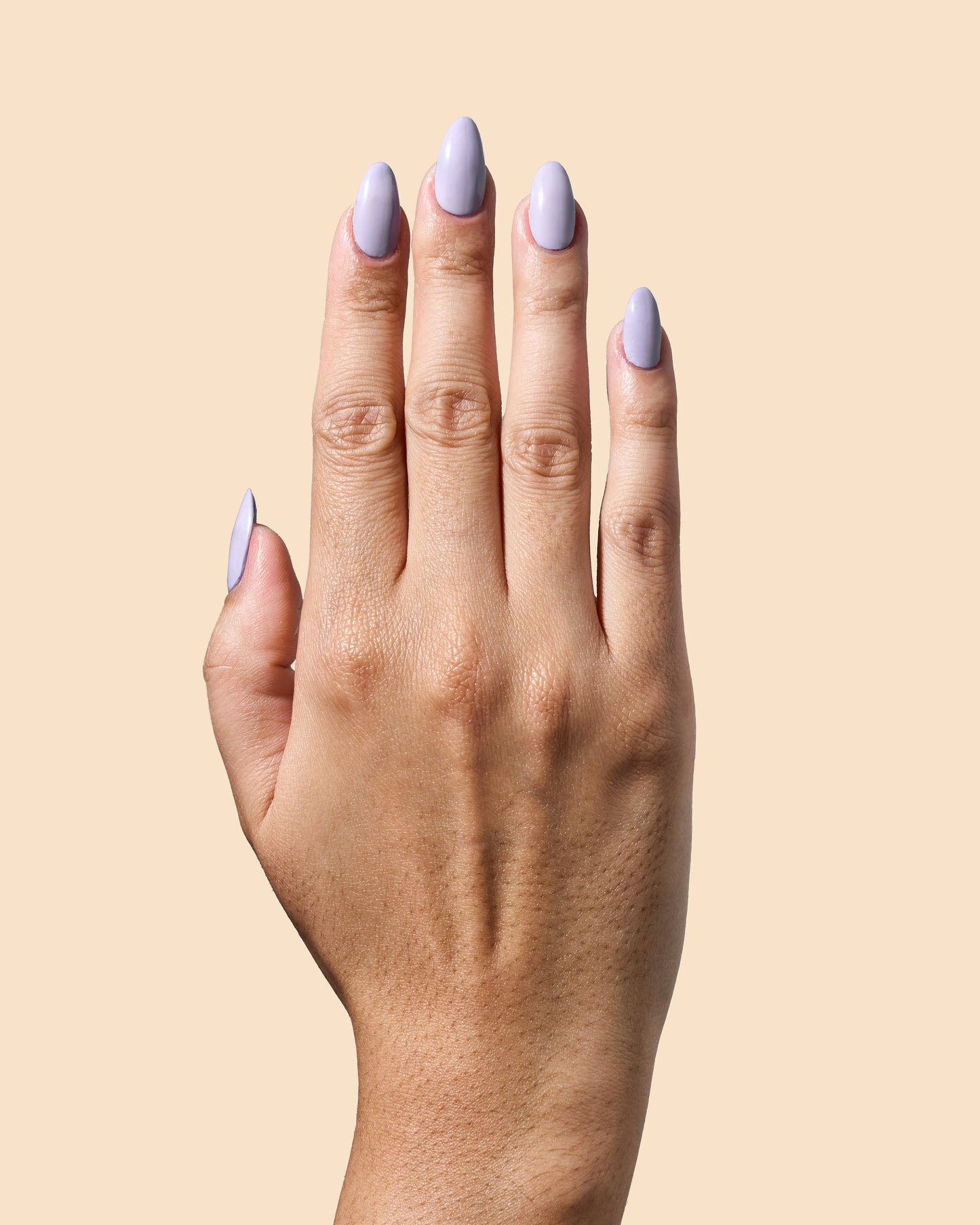Lavender crème nail polish designed for calm, polished looks.