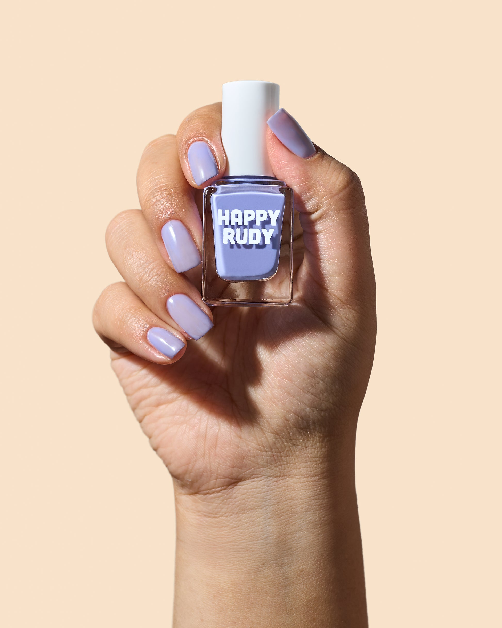 Glossy lavender jelly nail polish perfect for soft, sheer coverage.