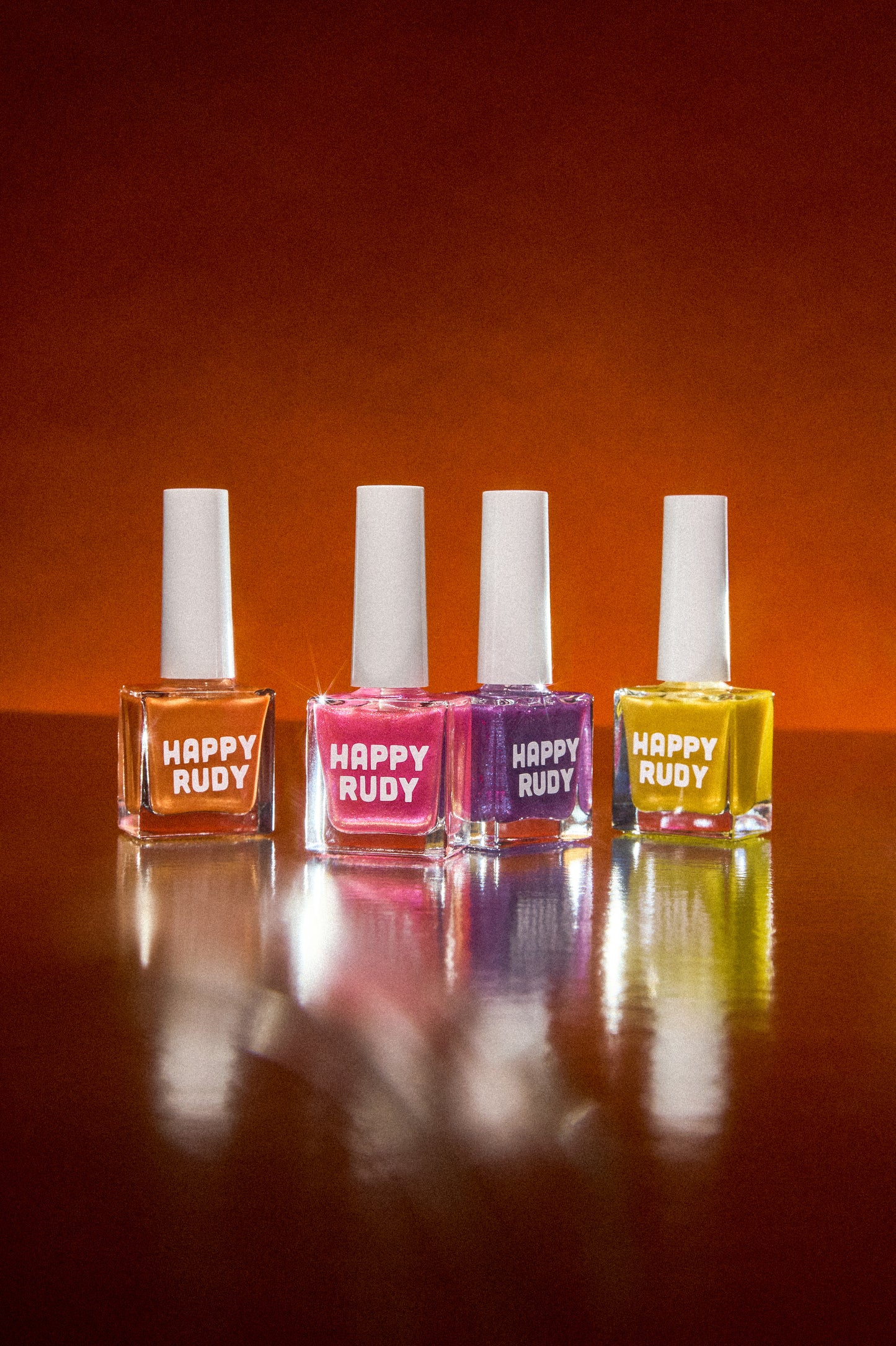 Group shot of the Studio 54 Collection featuring disco-inspired shimmer, glitter, and chrome nail polishes in bold, vibrant shades.