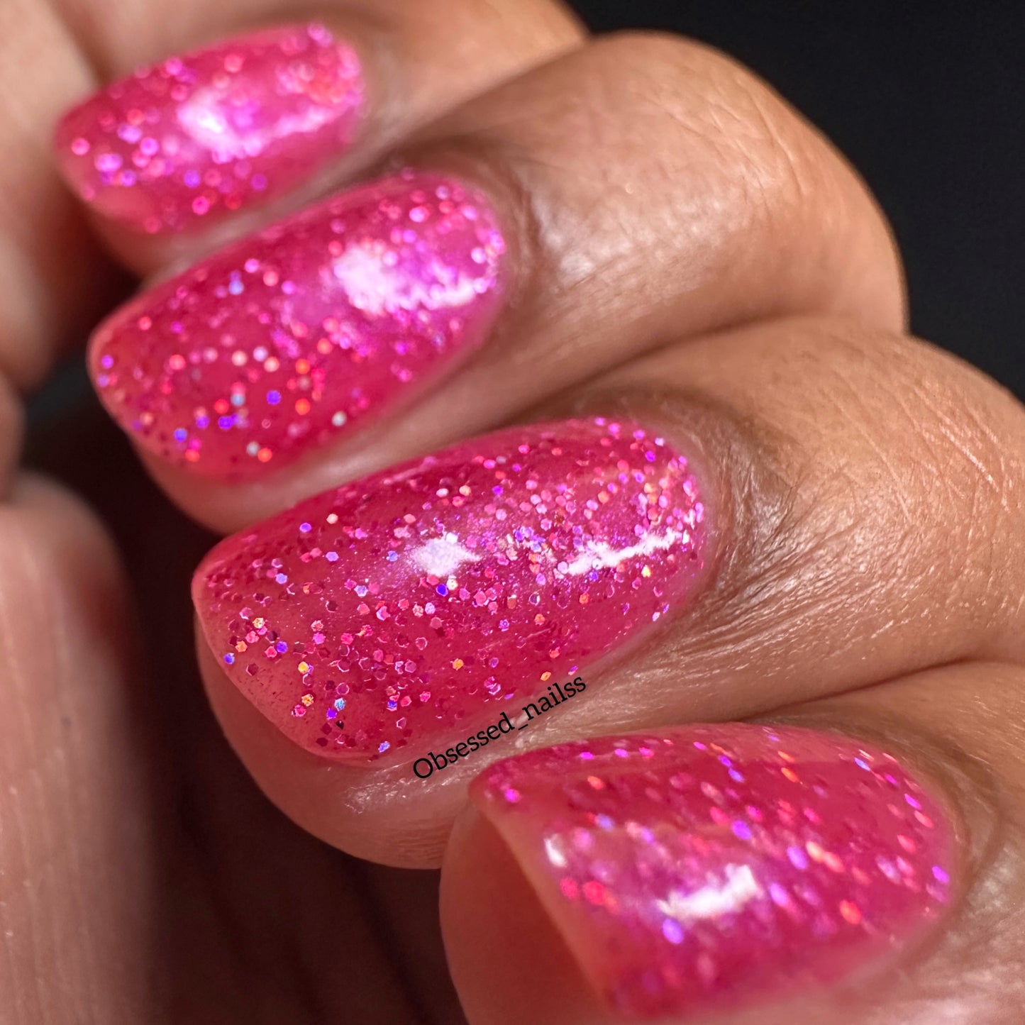 Vibrant pink glitter nail polish with eco-friendly sparkle from the Screen and Sparkles collection.