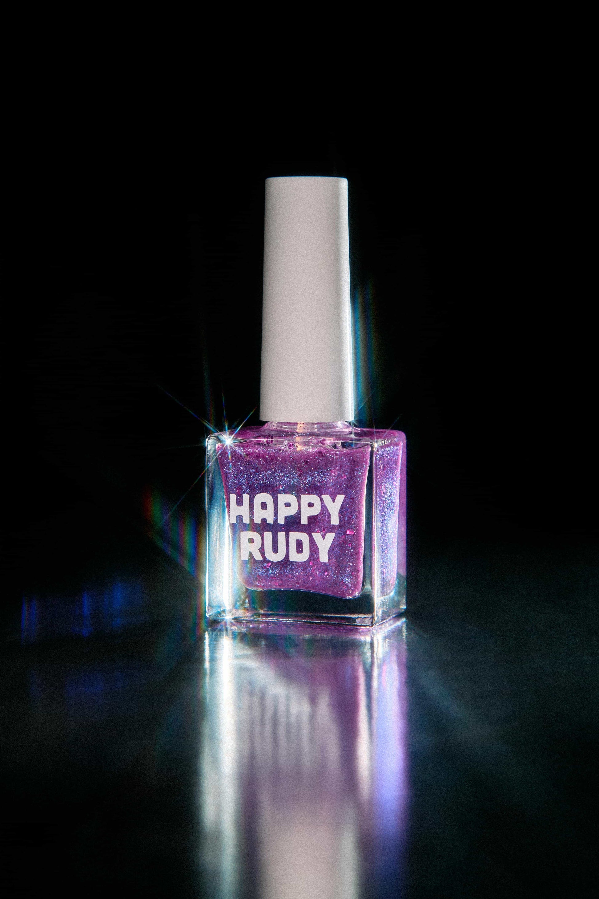 Donna: a vibrant purple jelly nail polish filled with magenta flakies