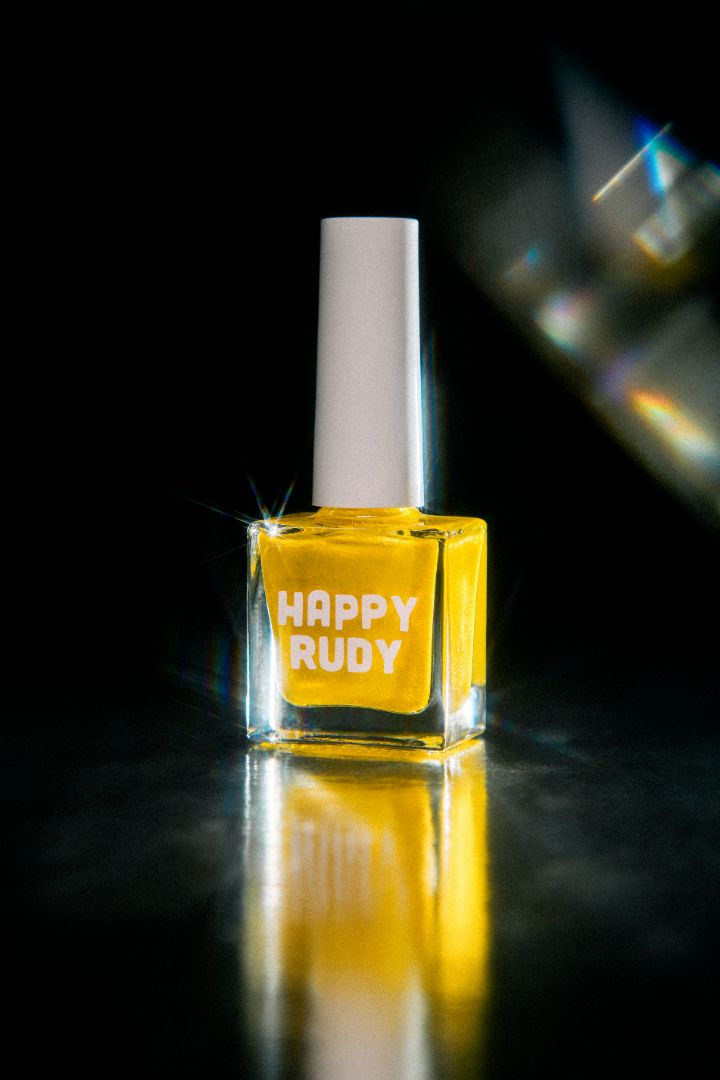 Four-on-the-Floor: a radiant yellow gold shimmer nail polish lacquer filled with eco-friendly glitter