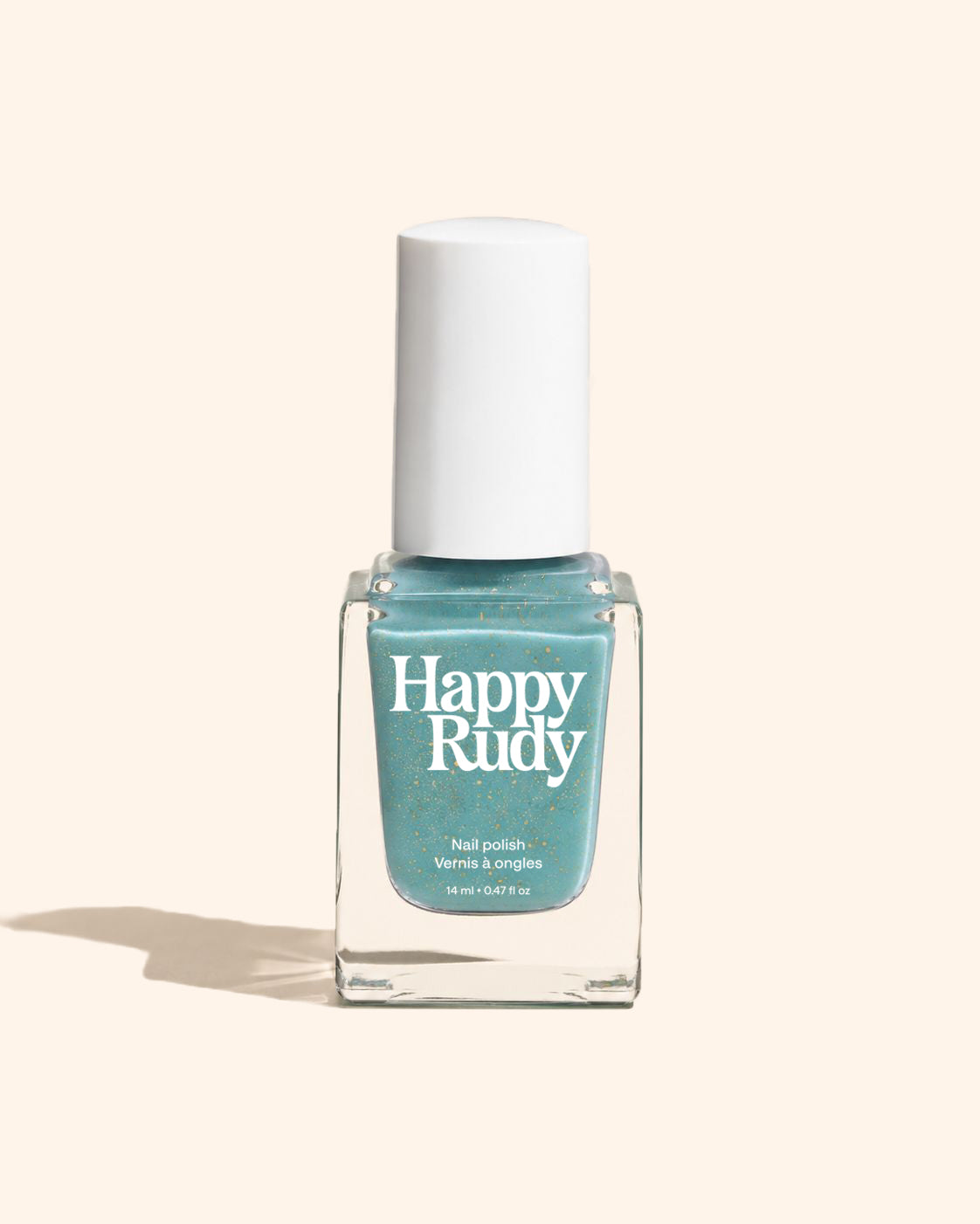 A bottle of Happy Rudy nail polish in a light blue-green shade with gold glitter, featuring a white cap and clear glass bottle, set against a solid pale beige background.