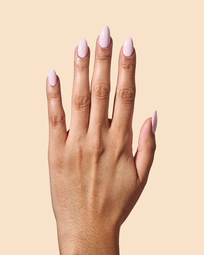 Milky baby pink crème nail polish perfect for vibrant spring nails.