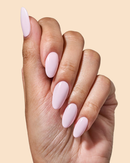 Milky baby pink crème nail polish perfect for vibrant spring nails.
