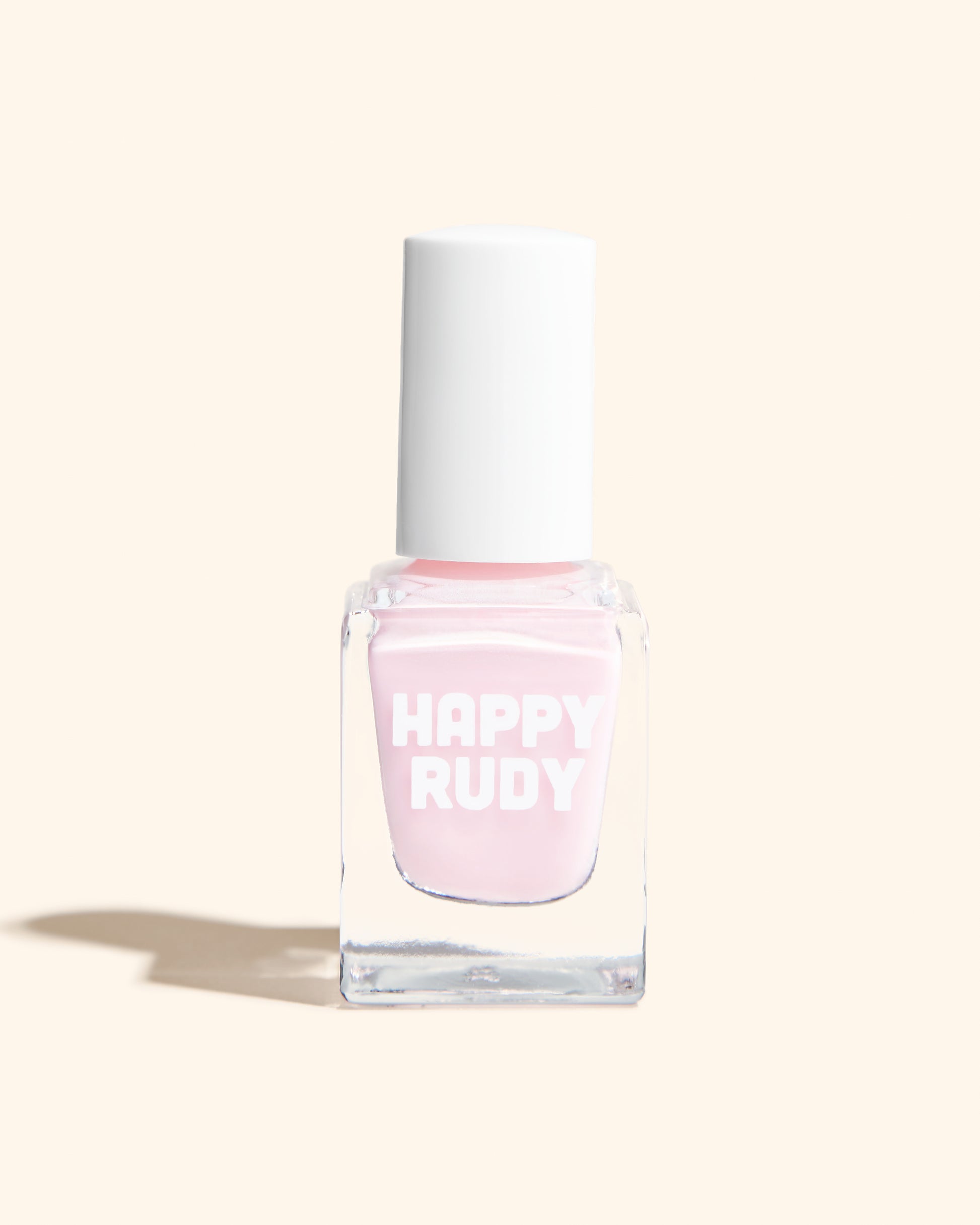 Milky baby pink crème nail polish perfect for vibrant spring nails.